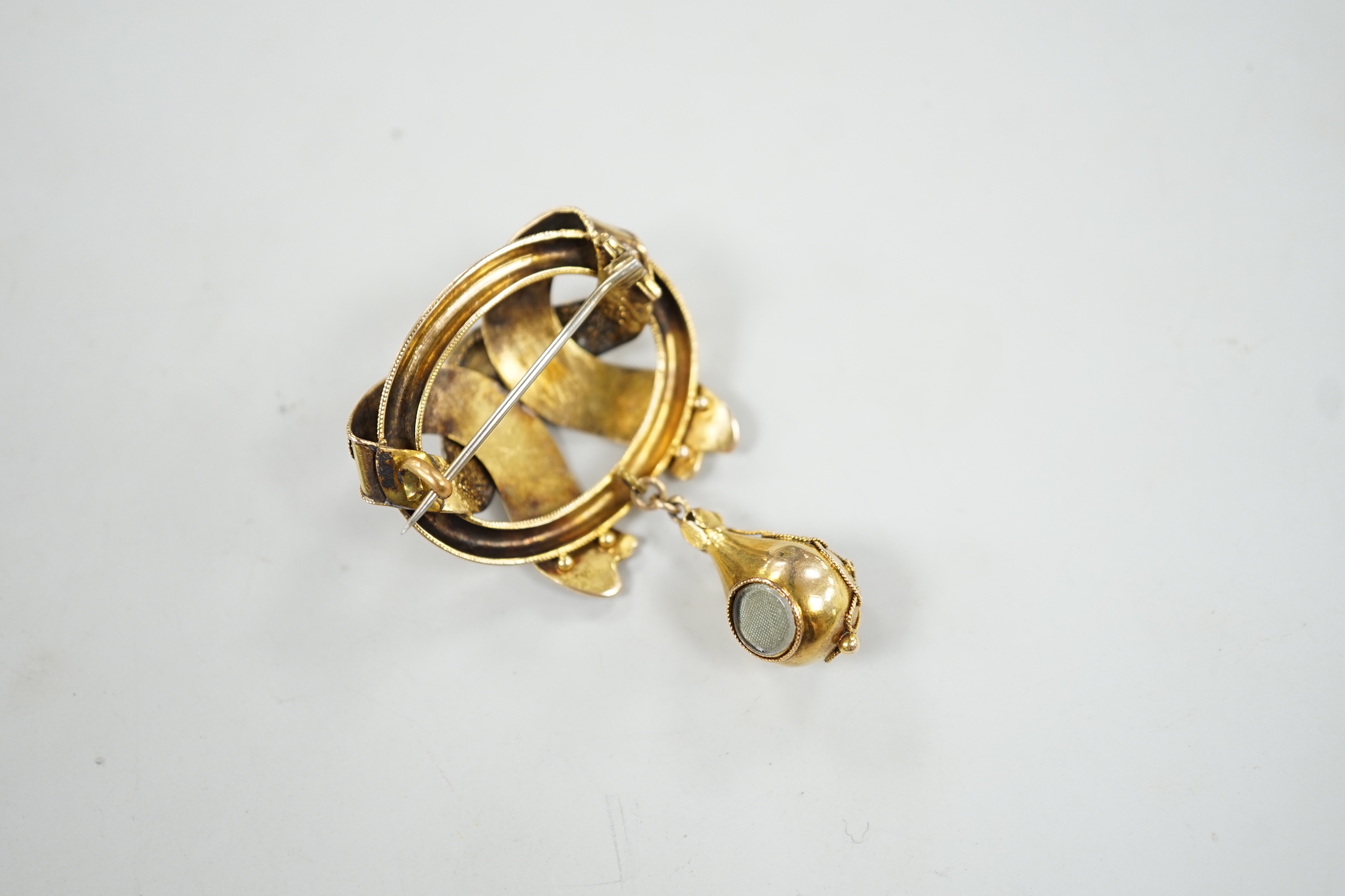 A Victorian yellow metal and foil backed garnet? set cannetile work drop brooch, 56mm, gross weight 12.7 grams.